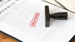A mortgage loan with a red stamp on it that says 'Loan Denied'
