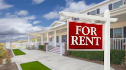 A build-to-rent property with a For Rent sign in the front yard
