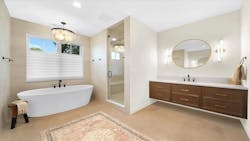 Bathroom with large free-standing tub and floating vanity Bathroom with large free-standing tub and floating vanity