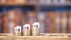Model homes on stacks of coins in ascending order Model homes on stacks of coins in ascending order
