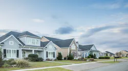 A row of new-build homes in a suburban area