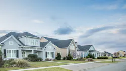 A row of new-build homes in a suburban area