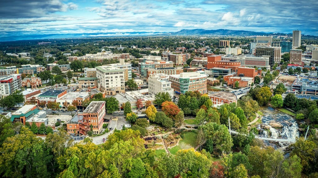 Skyline view of Greenville, S.C., under a cloudy sky