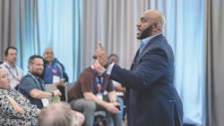 Speaker talking to a group of attendees at the International Builders' Show Centrals Speaker talking to a group of attendees at the International Builders' Show Centrals
