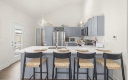 The Villas at Nexton kitchen with dining seating The Villas at Nexton kitchen with dining seating