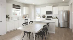Courtyard Homes at Easton Park kitchen with island seating