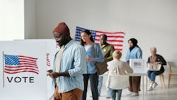 Voters stand in line ready to cast their ballots Voters stand in line ready to cast their ballots