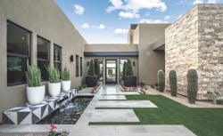 Entry courtyard to Camelot Homes' Chavel model Entry courtyard to Camelot Homes' Chavel model