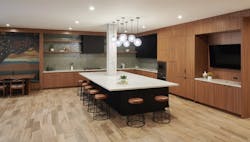 Club House kitchen island with dining seating at The Henry Club House kitchen island with dining seating at The Henry