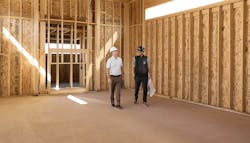 Camelot Homes Kevin Rosinski and Kyle Wolf walk a new home at framing Camelot Homes Kevin Rosinski and Kyle Wolf walk a new home at framing