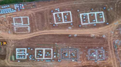 Aerial view of home lots, showing a subdivision in the process of being built