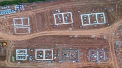 Aerial view of home lots, showing a subdivision in the process of being built Aerial view of home lots, showing a subdivision in the process of being built