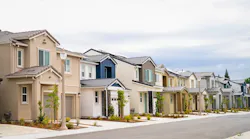 A row of single-family homes on a suburban street
