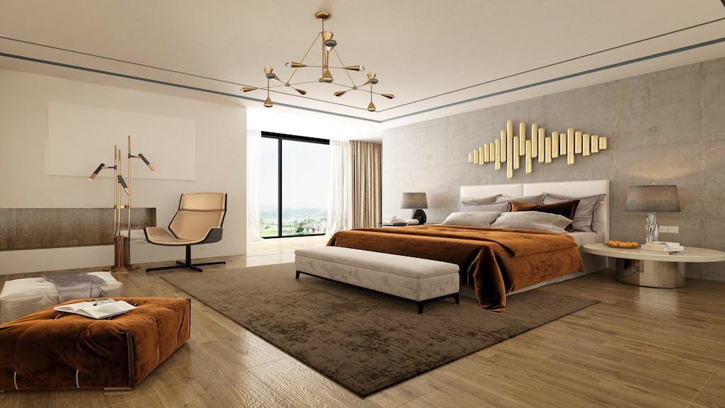 Contemporary-style guest bedroom with desk and seating area