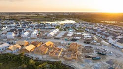 Aerial view of single-family community under construction Aerial view of single-family community under construction