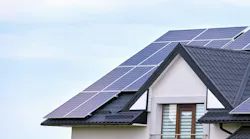 Solar panels on the roof of a home on a sunny day