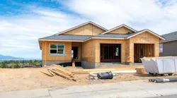 A single-family home sits under construction