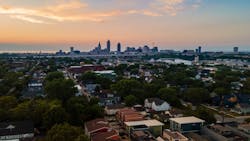 Neighborhood in Cleveland, Ohio, with city skyline in the background Neighborhood in Cleveland, Ohio, with city skyline in the background