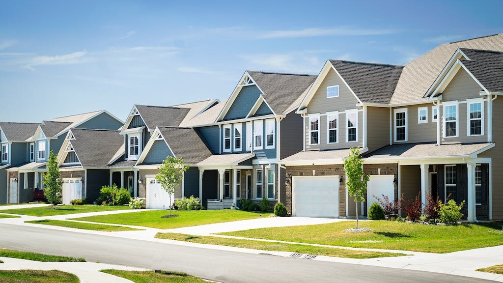 A row of newly built single-family homes