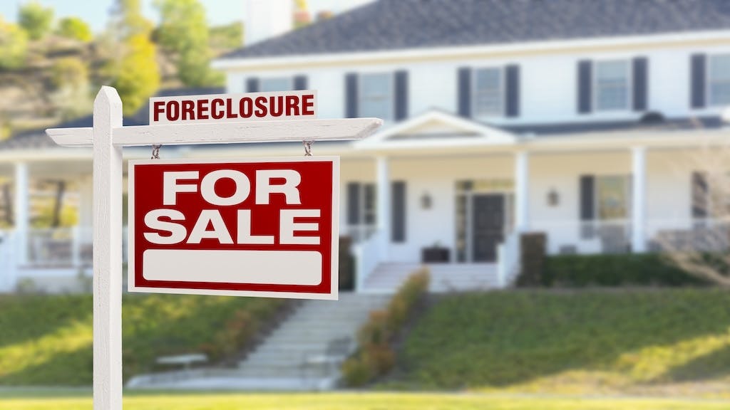 A home with a foreclosure notice