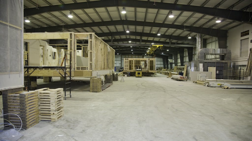 Homes being built in a factory