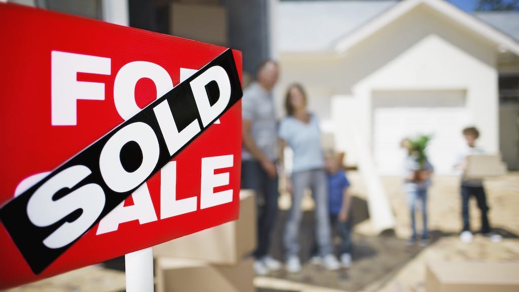 A family moves into their recently purchased home