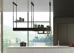 The Spazio Range Hood from Falmec's Circle.Tech collection installed in a kitchen The Spazio Range Hood from Falmec's Circle.Tech collection installed in a kitchen