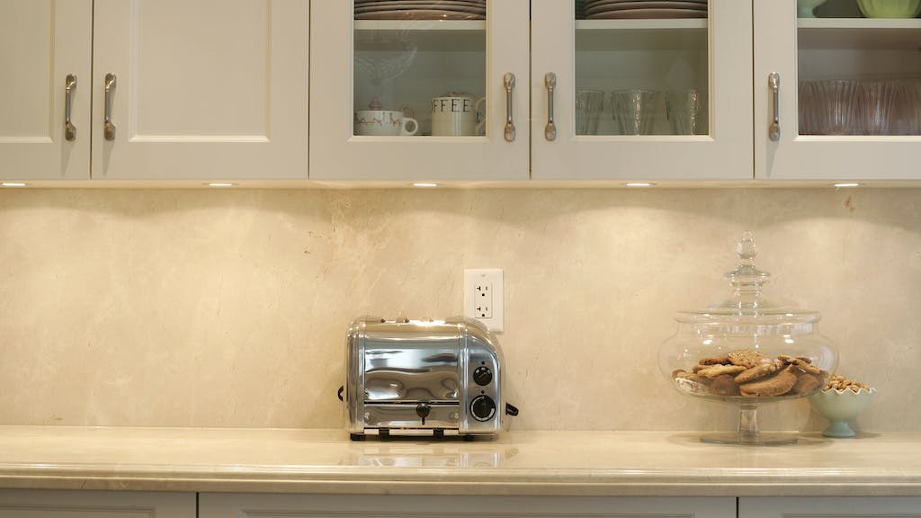 A warm, neutral kitchen backsplash