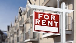 'For rent' sign in front of a row of homes for rent 'For rent' sign in front of a row of homes for rent