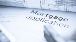 House plans with mortgage application paperwork