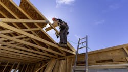 A construction worker frames the roof of a new home as single-family housing inventory sees an increase A construction worker frames the roof of a new home as single-family housing inventory sees an increase