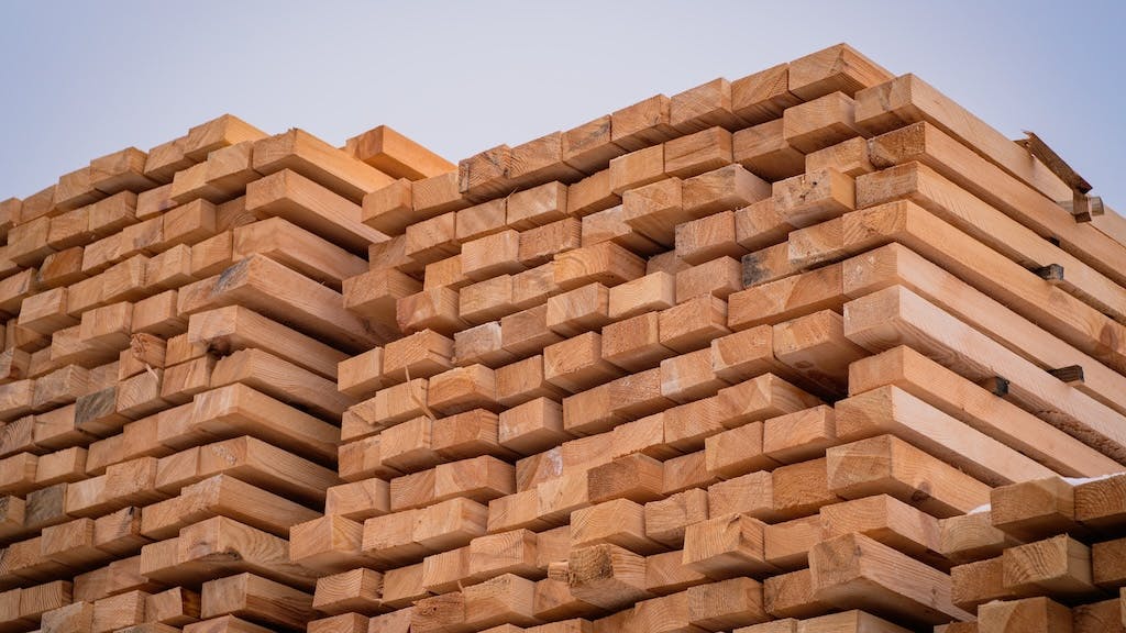 Stacks of lumber in a lumber yard as President Trump's tariffs on imports from Canada and Mexico go into effect