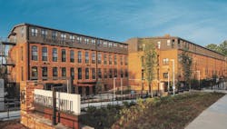 Exterior of adaptive reuse project Chronicle Mill after renovation Exterior of adaptive reuse project Chronicle Mill after renovation
