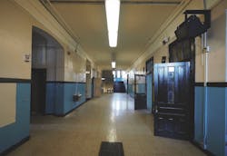 View down the hallway of the Peabody School adaptive reuse project before the building's renovation View down the hallway of the Peabody School adaptive reuse project before the building's renovation