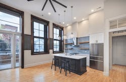 A kitchen in the Peabody School Apartments adaptive reuse project A kitchen in the Peabody School Apartments adaptive reuse project