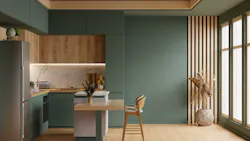 A modern green kitchen with wooden accents A modern green kitchen with wooden accents