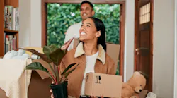A couple moving into their new home