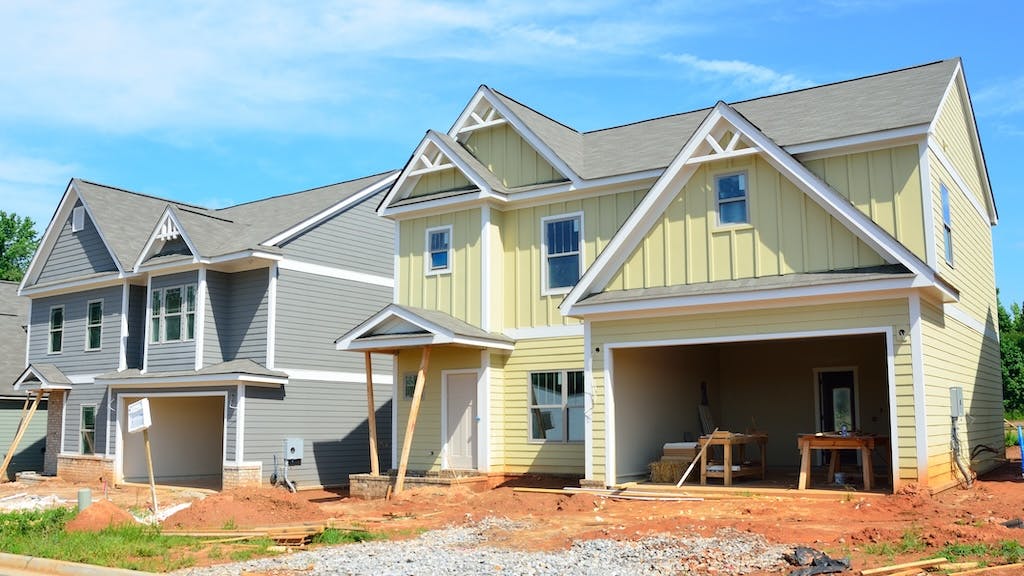 New housing development under construction as new-home sales see an uptick.