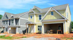 New housing development under construction as new-home sales see an uptick.