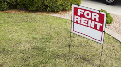 A 'For Rent' sign in a front yard as rent prices increase slightly.