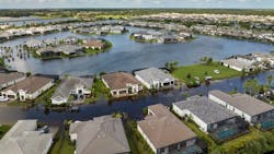 Homes flooded in the aftermath of a hurricane are a stark reminder of the impact of extreme weather events. Homes flooded in the aftermath of a hurricane are a stark reminder of the impact of extreme weather events.