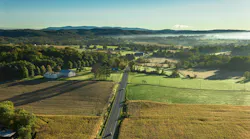 Aerial view of farm land in a rural county that is seeing its population decline.