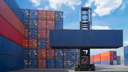 A cargo container being picked up by a forklift as the Trump administration's tariffs go into effect. A cargo container being picked up by a forklift as the Trump administration's tariffs go into effect.