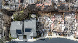 Two homes remain standing after the 2025 Eaton Fire in Altadena, Calif.