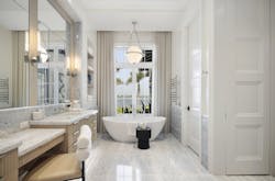 The primary bathroom in Cascade House designed by Stofft Cooney Architects includes a soaking tub with a view.. The primary bathroom in Cascade House designed by Stofft Cooney Architects includes a soaking tub with a view..