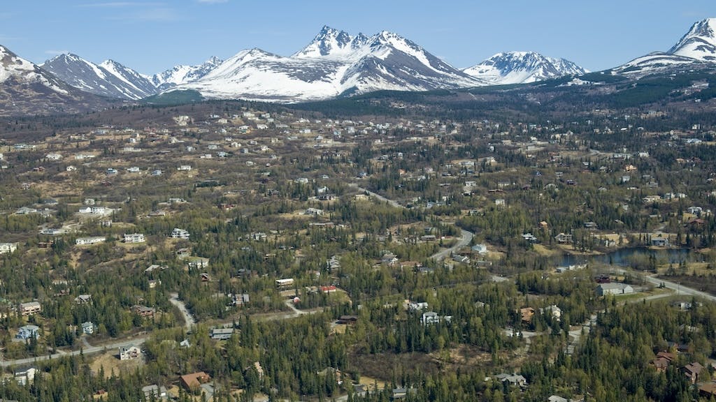 Aerial view of homes in Alaska, a state which has a relatively high number of people planning to leave.