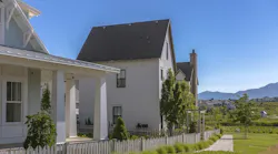 A homes with mountains in the background in Utah, the state that leads in new-home construction.