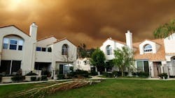 Fire creeping up on stucco homes in Southern California Fire creeping up on stucco homes in Southern California