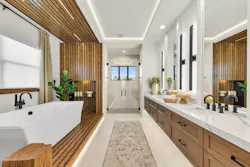Warm wood elements turn the primary bath at The Haven at Everly into an special space. | Photo: Luxie Oberg Warm wood elements turn the primary bath at The Haven at Everly into an special space. | Photo: Luxie Oberg