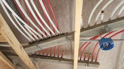 An example of a multiport tee with PEX-B pipe. An example of a multiport tee with PEX-B pipe.